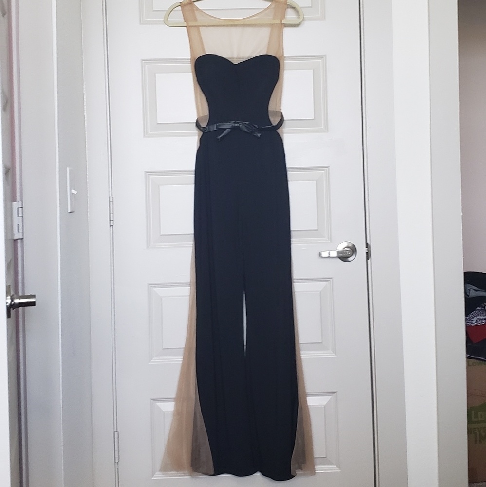 Jovani Black/sheer jumpsuit with bow accent